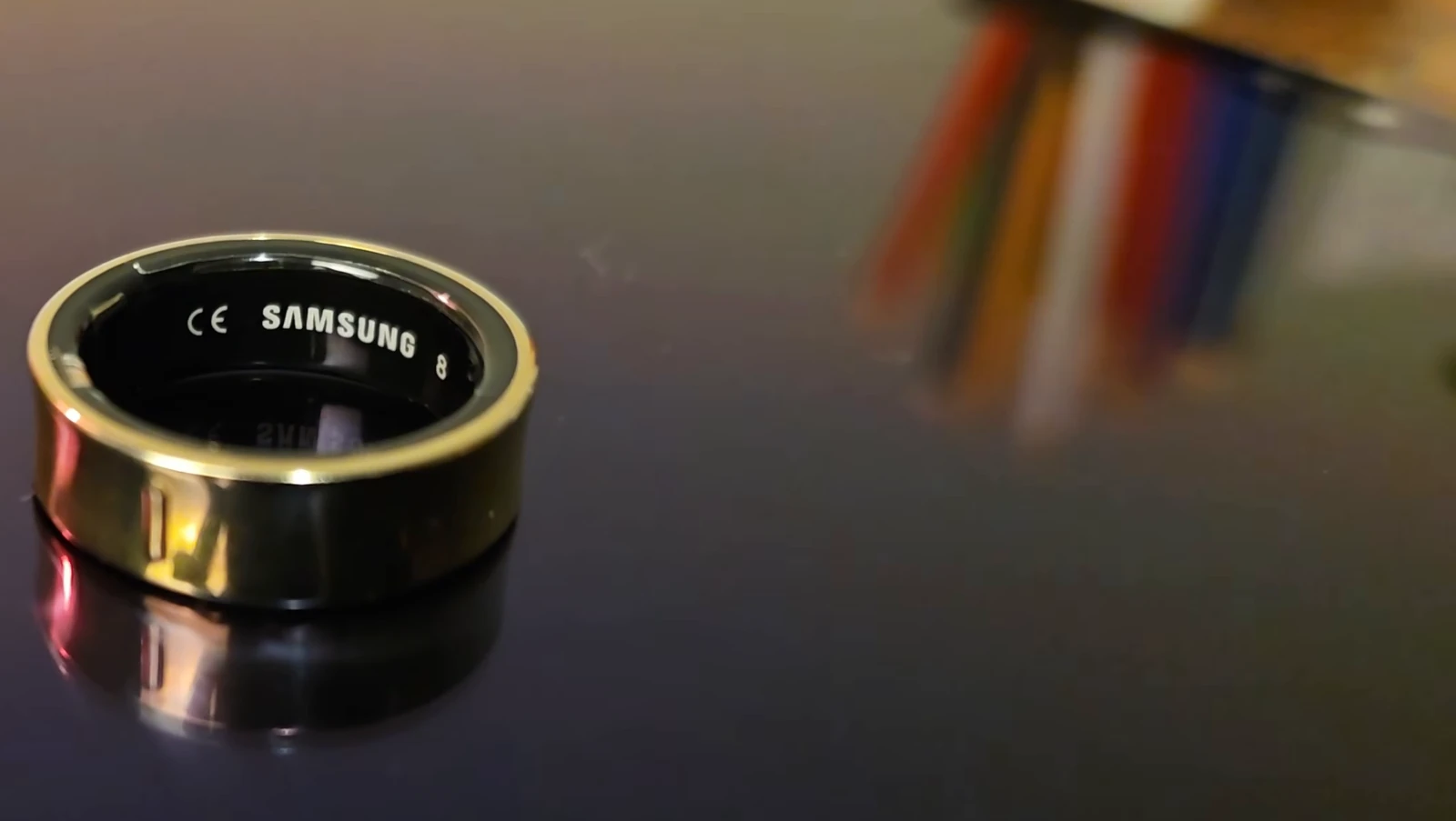 Close-up of the Samsung Galaxy Ring showing the concave band that dips inward through the middle