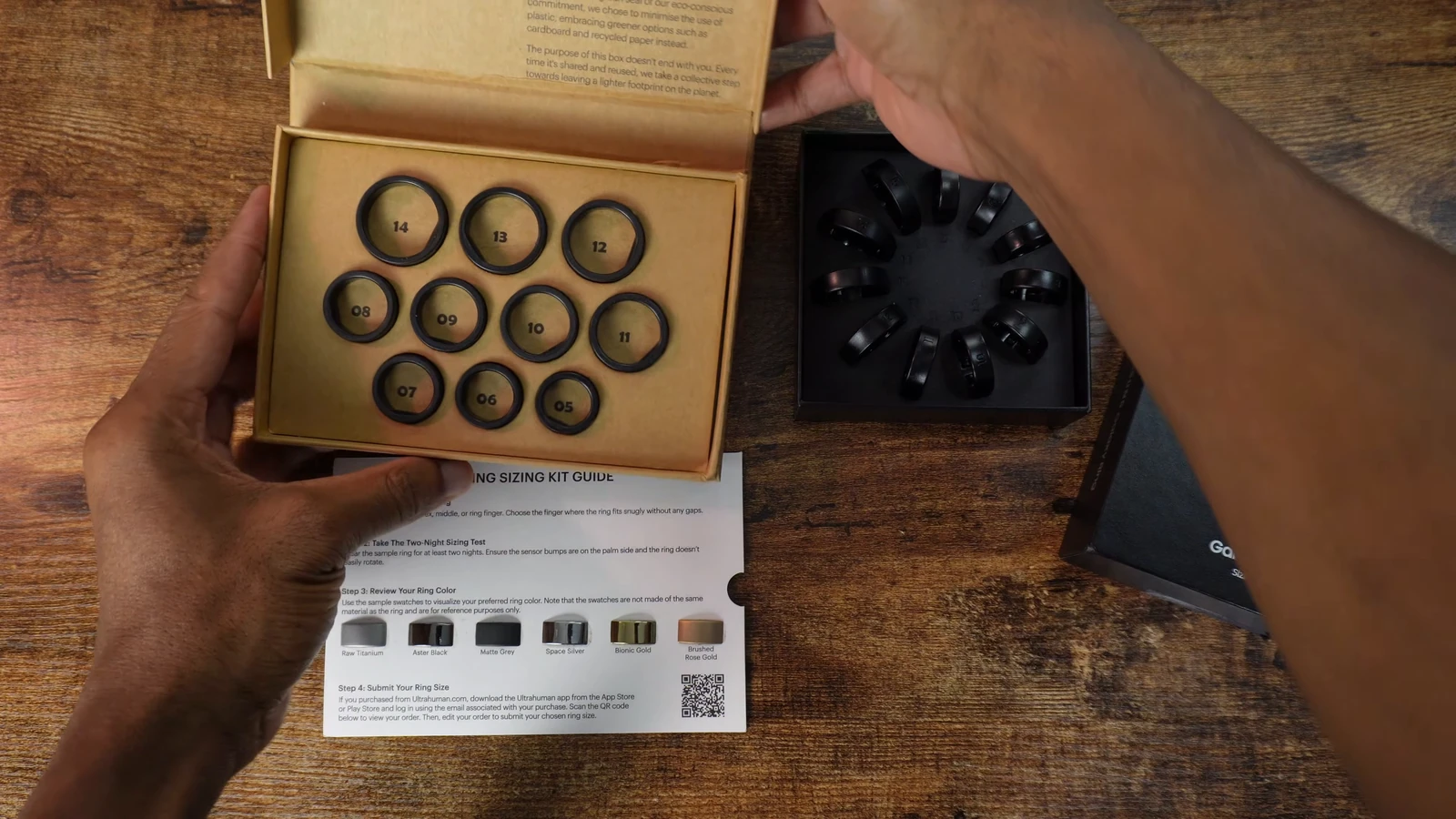 Ultrahuman Ring AIR sizing kit box with numbered sample rings and the printed sizing guide