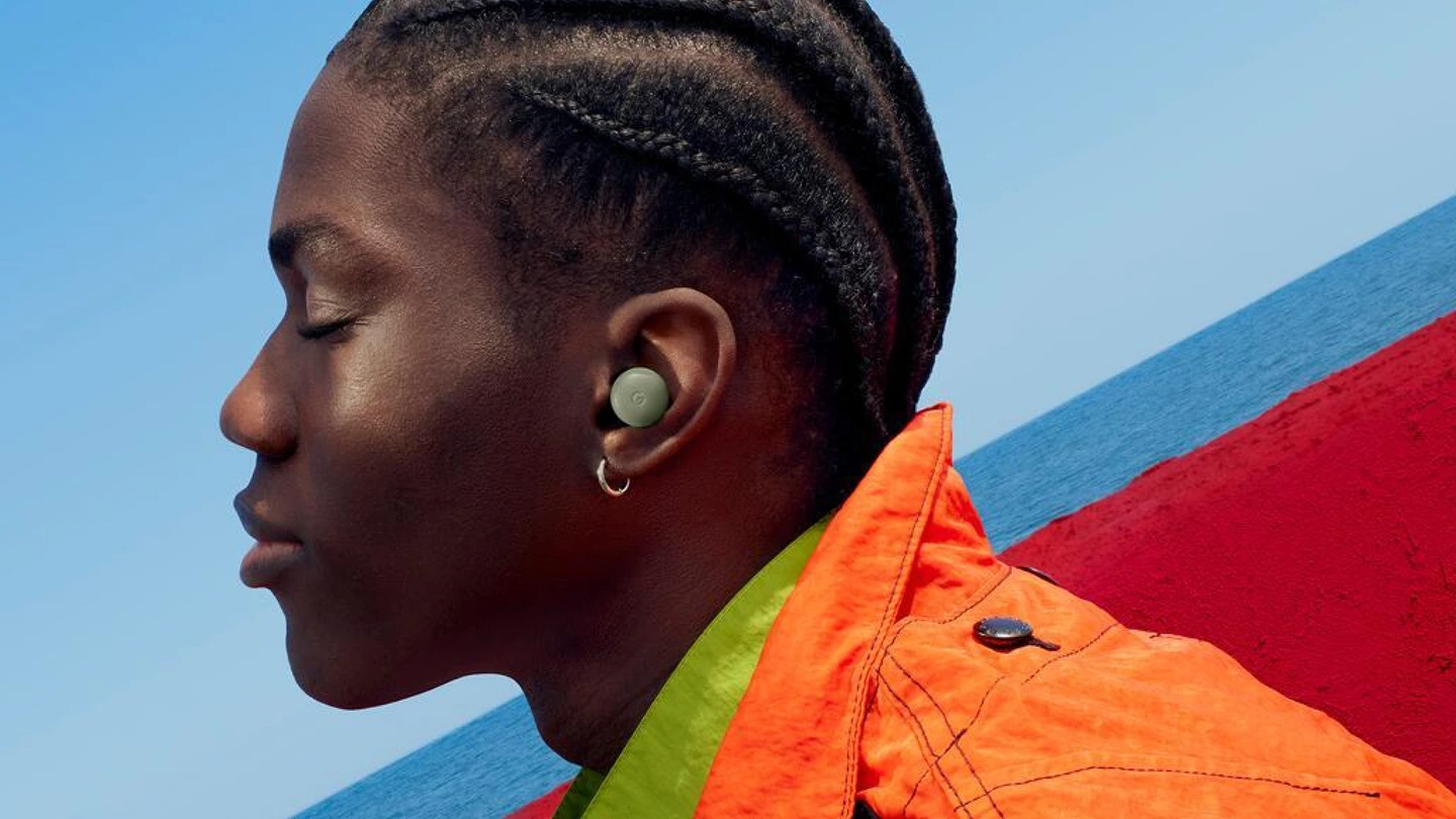 Person wearing Google Pixel Buds in Olive